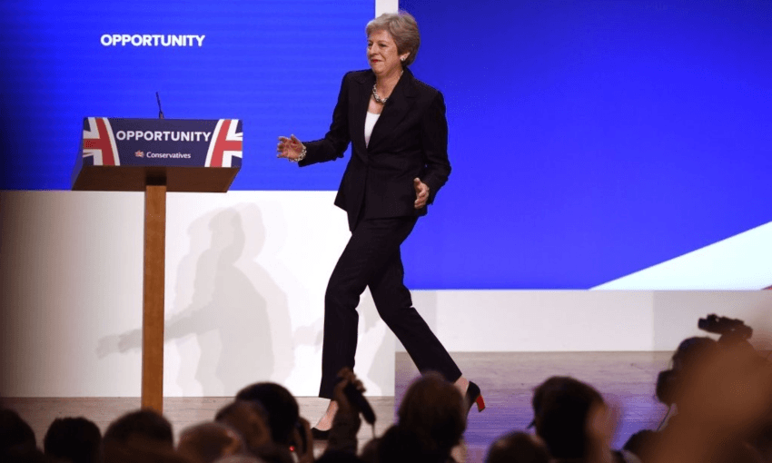 British PM Theresa May dancing robotically at the recent Conservative Party conference (no, really, she did that) (Getty Images)  
