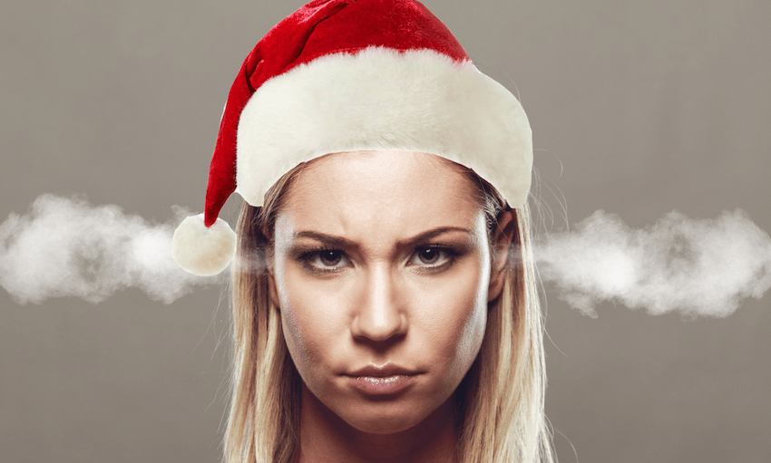 Angry woman in Santa hat Christmas 

