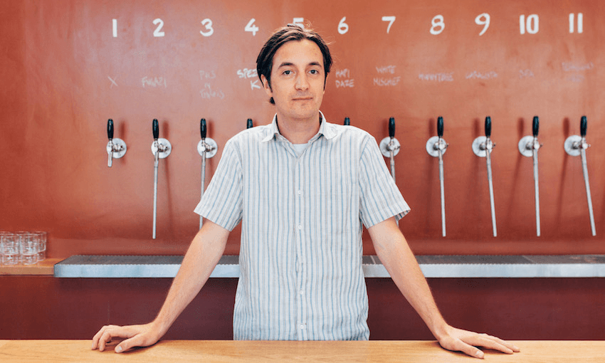 Jesse Schrader mans the Dorset Street taps (Photo: Naomi Haussman) 
