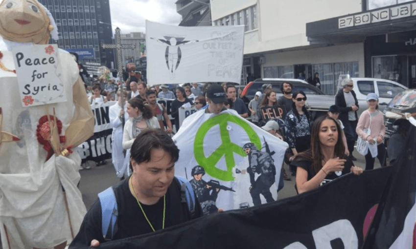 Protesters on the march in Palmerston North (Twitter – @OrgAotearoa)  
