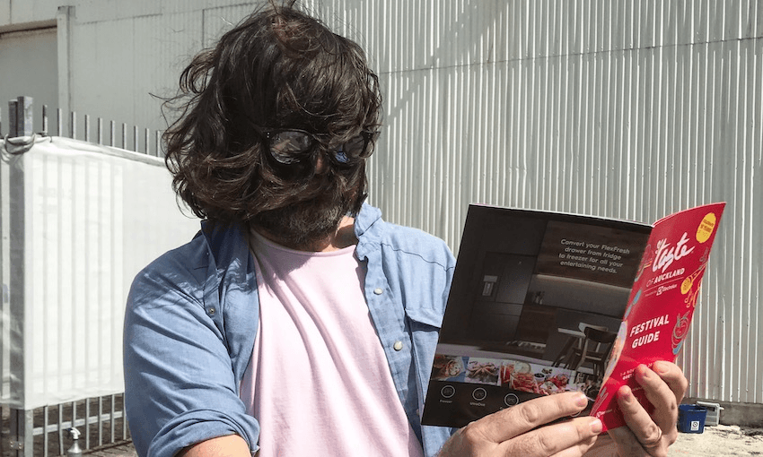 A wind-swept, gin-addled Samuel Flynn Scott plans his next move at Taste of Auckland (Photo: Alice Neville)