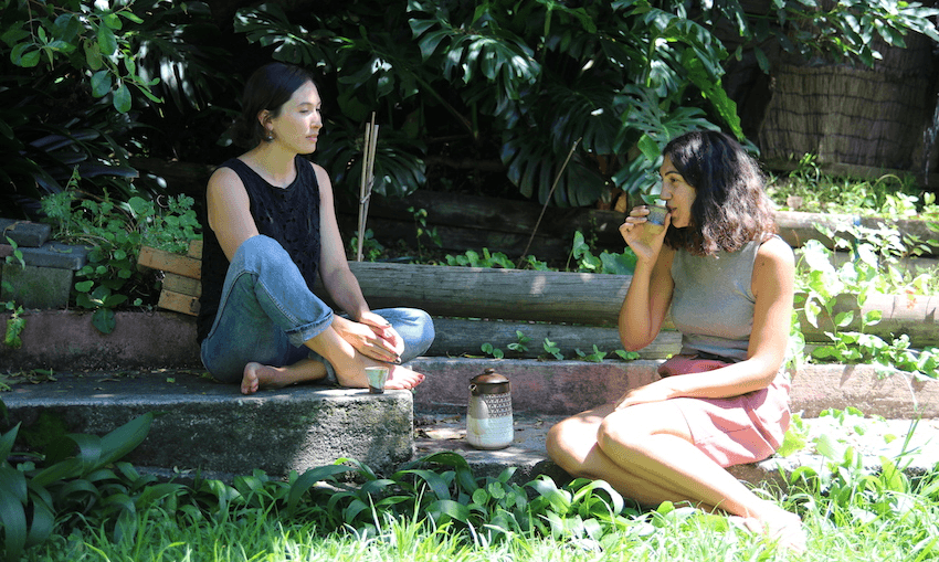 Whitney Nicholls-Potts (left) and Whitney Wainui take a tea break (Photo: Celia Hall) 
