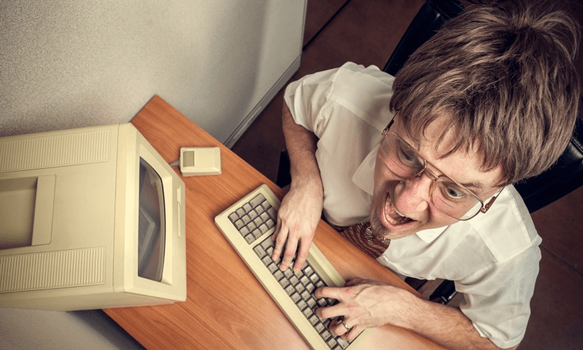 A keyboard warrior about to hit send on his latest Not All Men tweet (Getty Images)  
