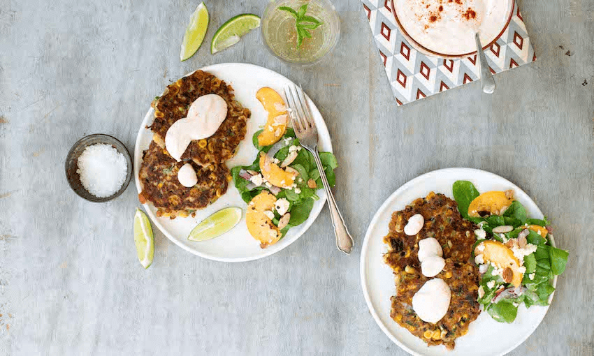 Corn fritters are an absolute classic, here jazzed up with a few flavoursome extras. They’re served with a peach, rocket and feta salad – recipe coming next week (Photo: Emma Boyd) 
