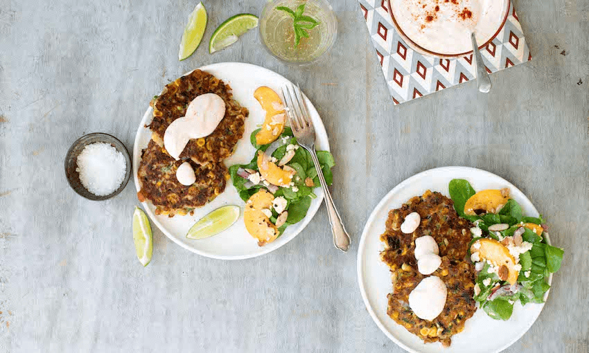 Corn fritters are an absolute classic, here jazzed up with a few flavoursome extras. They’re served with a peach, rocket and feta salad – recipe coming next week (Photo: Emma Boyd)