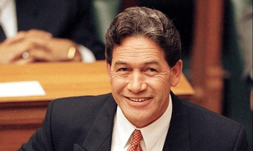 A smiling Winston Peters delivers the 1998 Budget (Photo by Ross Land/Getty Images) 
