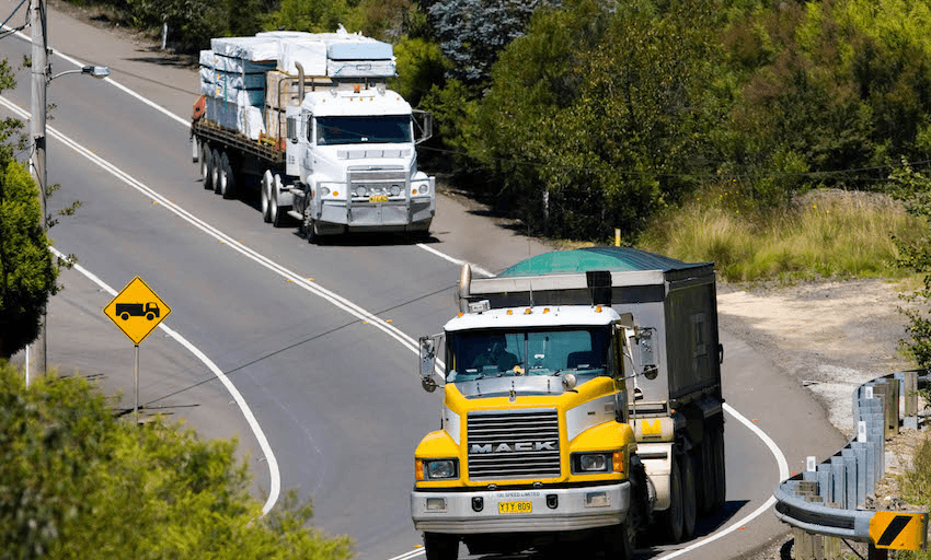Truck drivers under immense time pressure regularly break the law to get the job done, a new study says. (Photo shows trucks on the Great Western Highway, Australia, in 2007. Photo by Tim Graham/Getty Images)