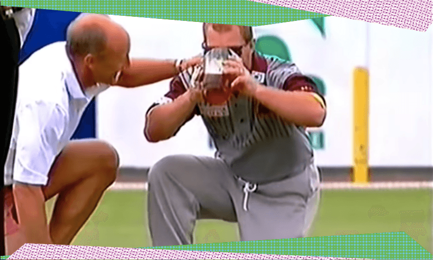 Allan ‘Alfie’ Langer pauses mid-over to drink a jug of beer during the Allan Border testimonial in 1993 
