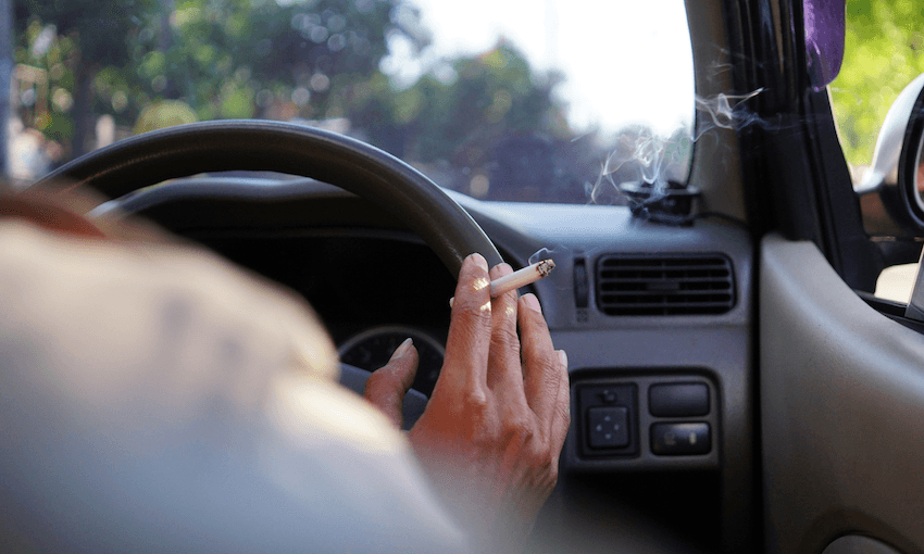 Smoking while driving a car