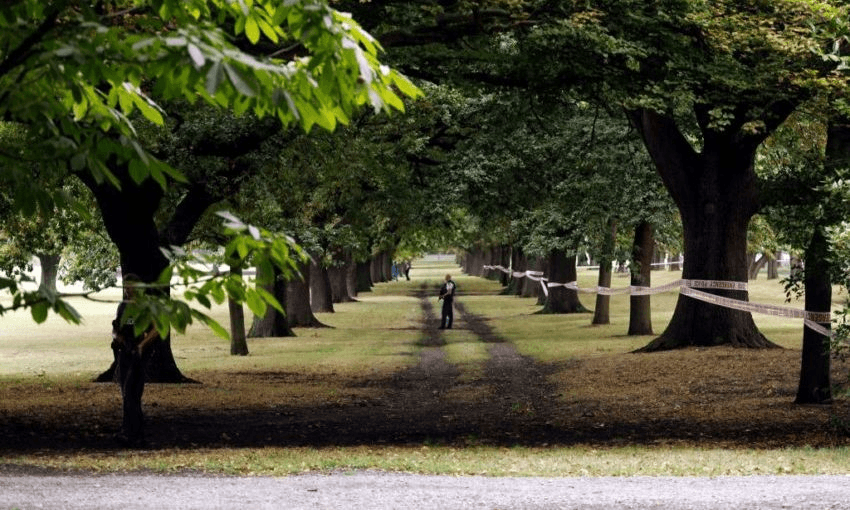 A security official stands guard near the Masjid al Noor mosque on March 15, 2019 (Photo by Tessa BURROWS / AFP / Getty)
