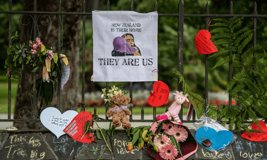 Flowers and tributes hung on the fence of the Botanic Gardens (Photo: Carl Court/Getty Images) 
