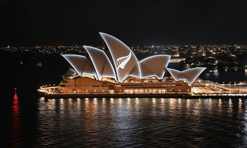 A silver fern is projected onto the sails of the Opera House following the Christchurch attack (Photo: James D. Morgan/Getty Images) 
