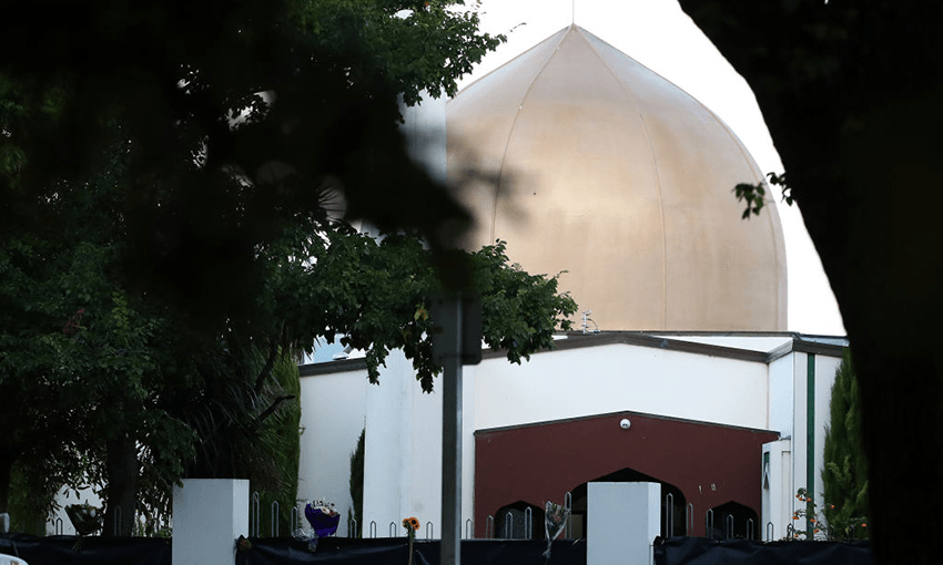 Flowers are left outside the Al Noor mosque on Deans Rd March 17, 2019 in Christchurch. Photo by Fiona Goodall/Getty Images 
