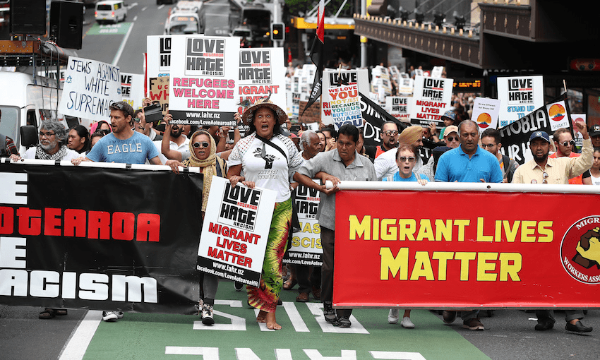 Thousands march up Wellesley St, Auckland to rally against racism on March 24, 2019. Photo by Fiona Goodall/Getty Images 

