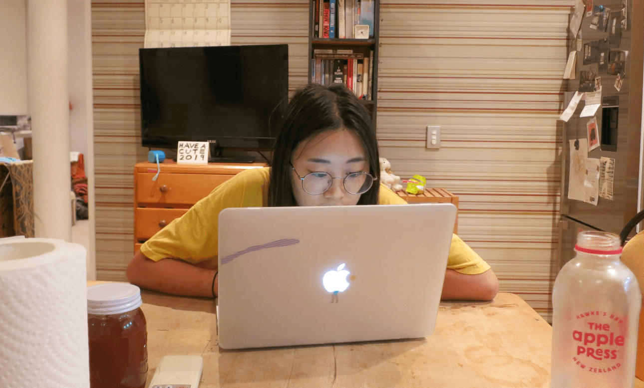Wellington writer Sharon Lam either hard at work on her second novel, or on Reddit. (Photo: Supplied) 
