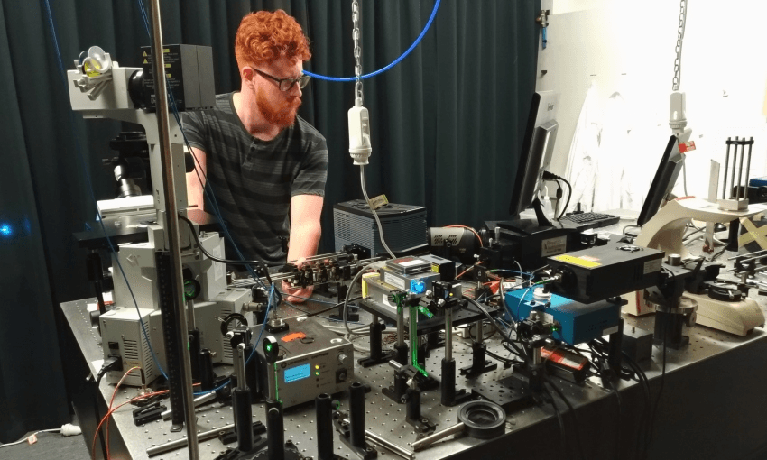 Sam Brooke working in the Raman Lab at Massey University (Supplied)