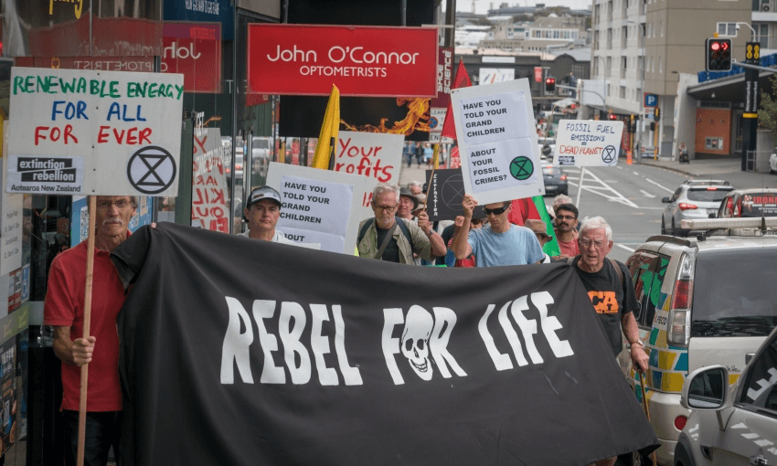 Extinction Rebellion protesters marching towards BP New Zealand’s head office in Newmarket (Image: Carl Naus)  
