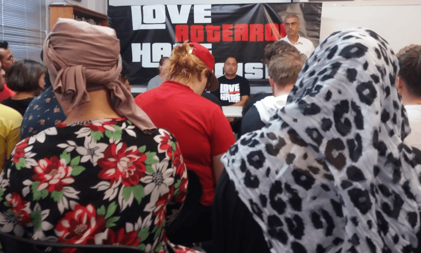 Attendees at an Auckland meeting to respond to the terrorist attacks in Christchurch, listening to Palestinian New Zealander Billy Hania (Image: Alex Braae)  
