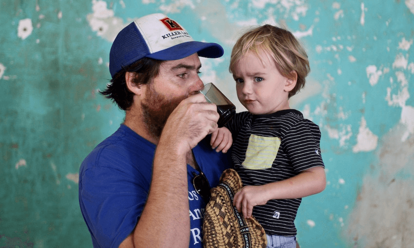Samuel Flynn Scott tries Supreme’s new instant coffee, with slightly irked coffee-deprived companion Gus in tow (Photo: Jason Kim) 
