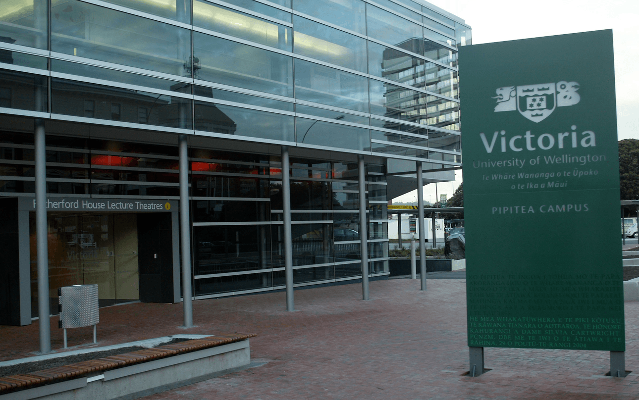 a glassy building with a big "VUW" sign outside