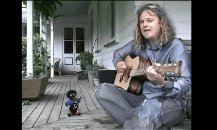 Craig Smith (right) and a golliwog (Sreenshot: Craig Smith Youtube) 
