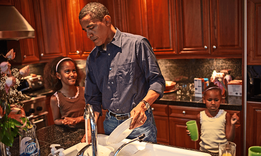 Hyde Park, Chicago, IL, October 2, 2006 Obama and the girls get breakfast and wash the dishes. This morning he took the girls to school and Michelle Obama went to work. Image: Callie Shell. 
