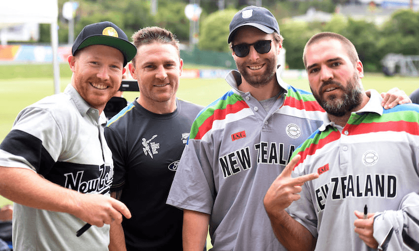 Simon Day (far right) dressed in his priceless 1992 shirt with former Black Caps captain Brendon McCullum, and two unknown fans, at the 2015 Cricket World Cup. (Photo: Andrew Cornaga / www.photosport.co.nz) 
