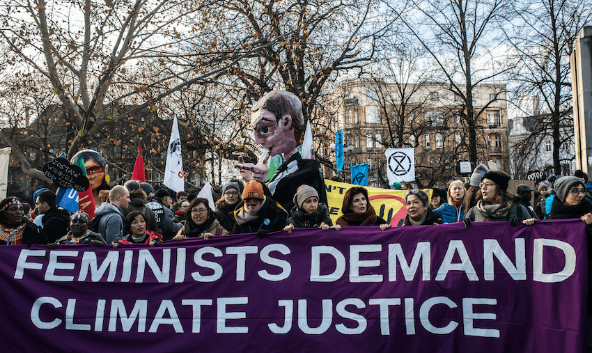 Women march in a Greenpeace-organised protest in Katowice, Poland in December last year (Photo: Martyn Aim/Getty Images) 
