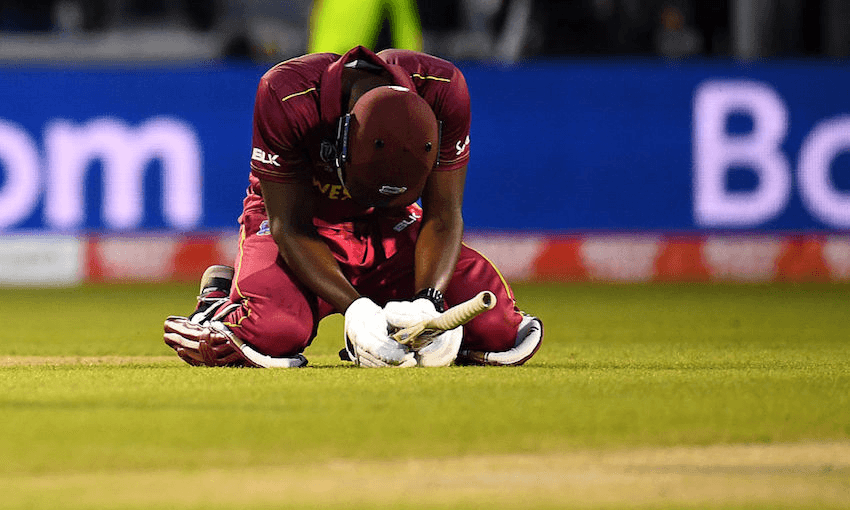 Carlos Brathwaite of West Indies after coming so close to overhauling New Zealand at Old Trafford. Photo by Clive Mason/Getty Images 
