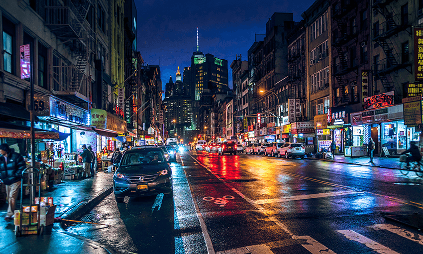 East Broadway on a rainy winter night. Image: Getty Images. 
