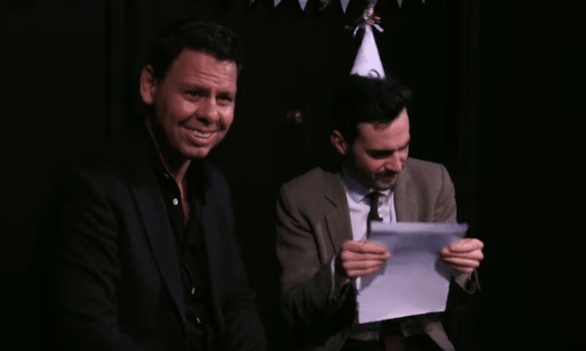 Patrick Gower and Robbie Nichol (White Man Behind a Desk) 
