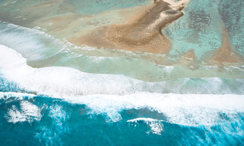 Aerial view of some of the islands an islets of Kwajalein Atoll, Marshall Islands. One of the first groups of islands that will disappear due to sea level rise because of climate change. Ebeye Island is one of the most populated pieces of land on Earth.  
