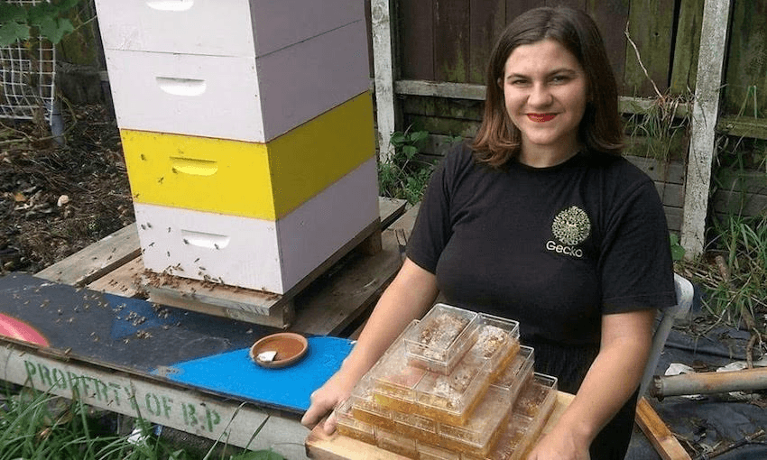 Ella Rose Schnapp with honey from her own beehives (Photo: Supplied) 
