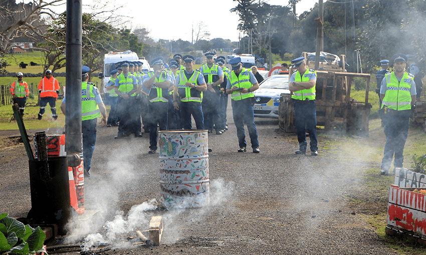 Police at Ihumātao on July 23, 2019, following the eviction of protestors.  
