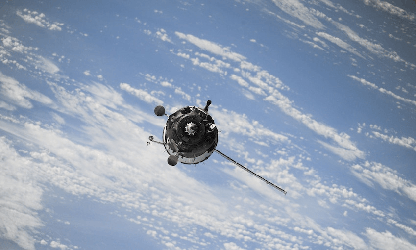 A satellite orbits the Earth. Photo by NASA on Unsplash 
