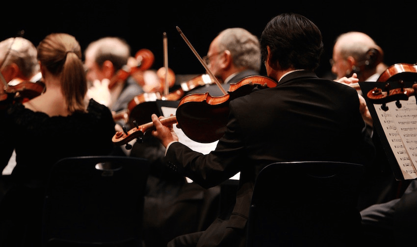 An orchestra plays the same sounds, but what about the ears? 
