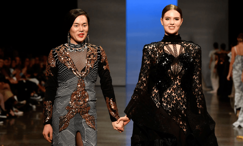 Designer Cecilia Kang (left) during the New Generation Emerging Couture show during New Zealand Fashion Week 2018 (Photo by Stefan Gosatti/Getty Images) 
