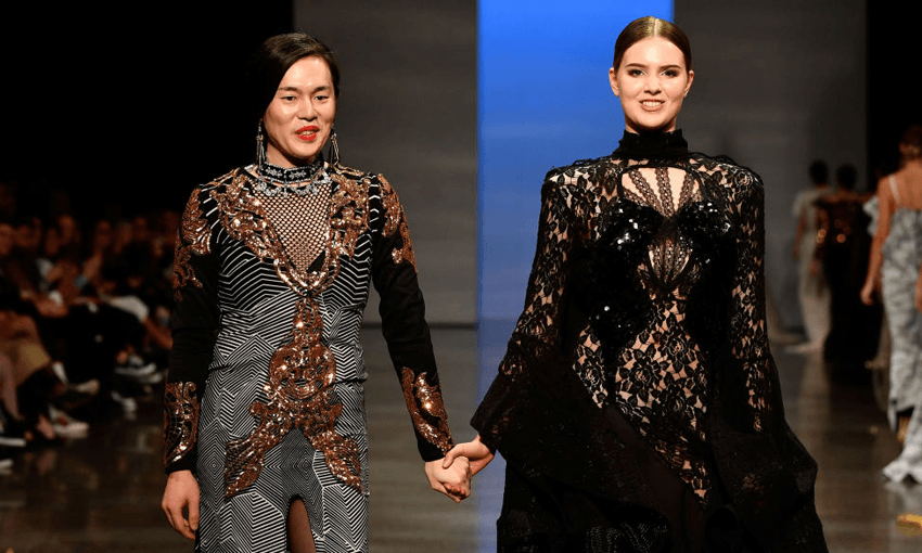 Designer Cecilia Kang (left) during the New Generation Emerging Couture show during New Zealand Fashion Week 2018 (Photo by Stefan Gosatti/Getty Images)