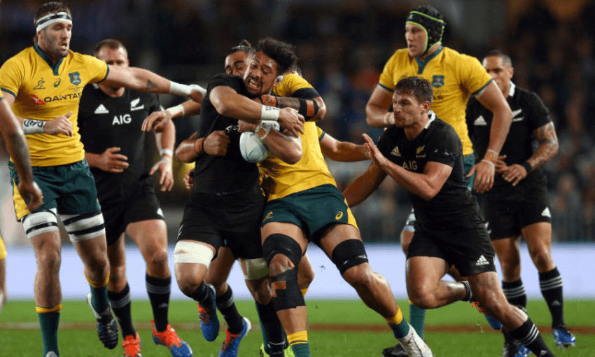The peerless Ardie Savea wanders through the Wallabies at Eden Park (Photo: Renee McKay/Getty Images)