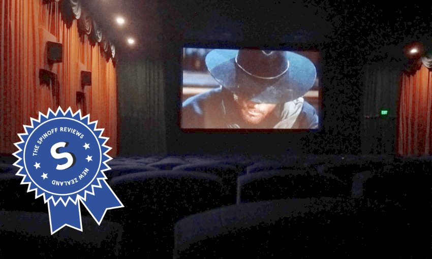 An ad on the screen, showing to an almost entirely empty cinema (Image: Alex Braae) 
