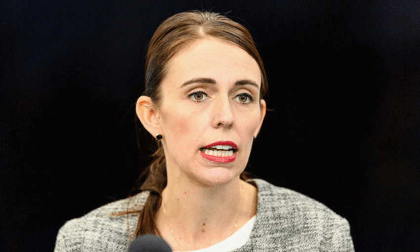 Jacinda Ardern speaks at a press conference in March. (Photo by Kai Schwoerer/Getty Images) 
