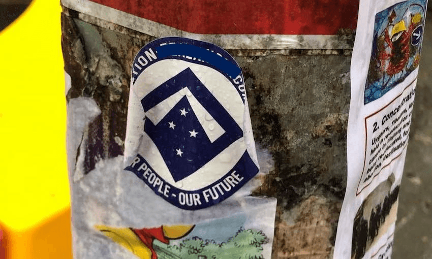 One of the posters on Auckland University campus. We’ve censored the name of the website (Photo: Craccum) 
