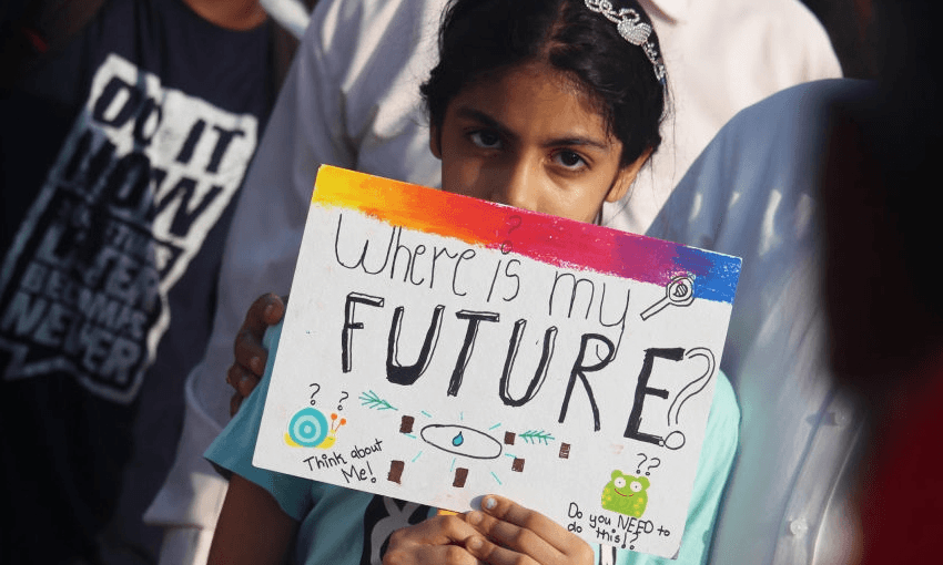 A girl in India taking part in a climate protest (Photo by Himanshu Bhatt/NurPhoto) 
