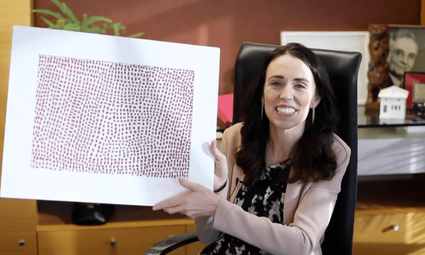 Jacinda Ardern with a piece of art gifted to her by a constituent (Photo: Supplied) 
