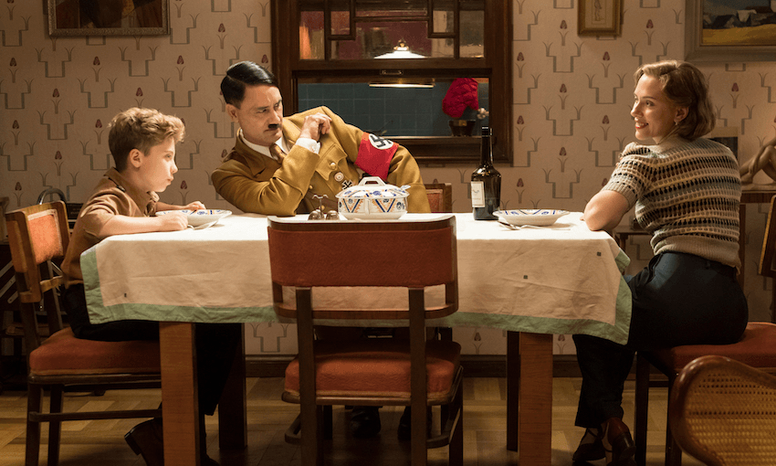 Jojo has dinner with his imaginary friend Adolf, and his mother, Rosie. Photo by Kimberley French.