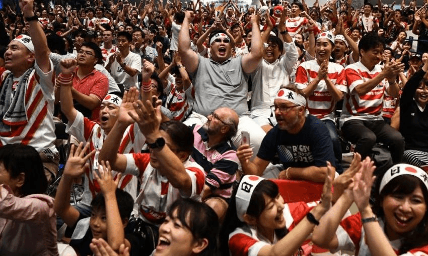 Japan supporters at the Tokyo fanzone during the match between Japan and Scotland in Yokohama. (Photo by Anne-Christine POUJOULAT / AFP via Getty Images) 

