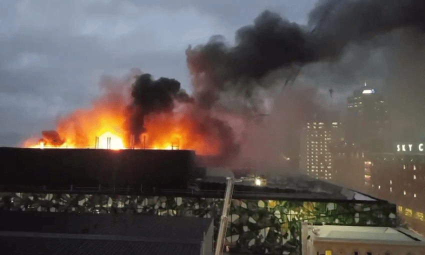 Flames on the roof of the SkyCity Convention Centre (Supplied, Harsh Khanna) 
