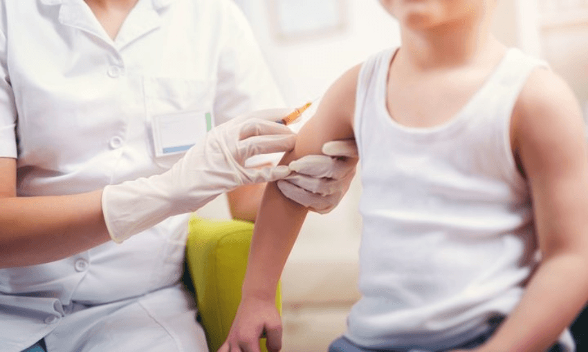 A child receives a measles immunisation. Photo: RNZ