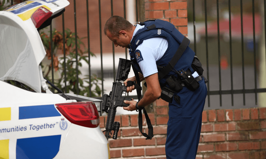 An armed police officer outside Otahuhu College on May 11, 2018 (Photo by Phil Walter/Getty Images) 

