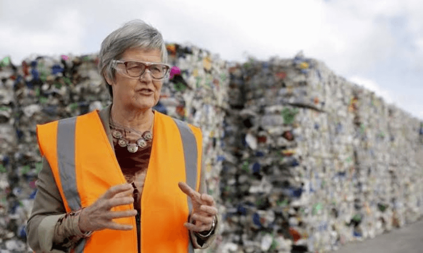 Associate environment minister Eugenie Sage, who oversaw the 2019 National Litter Audit, standing in front of an un-recycled pile of plastic (Radio NZ, Ana Tovey)